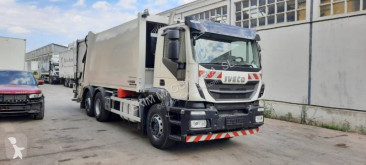 Maquinaria vial Iveco camión volquete para residuos domésticos usado
