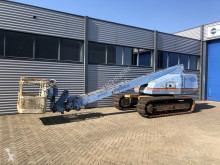 Plataforma elevadora Aichi SR182 hoogwerker rupshoogwerker 1997 plataforma sobre cadenas usada