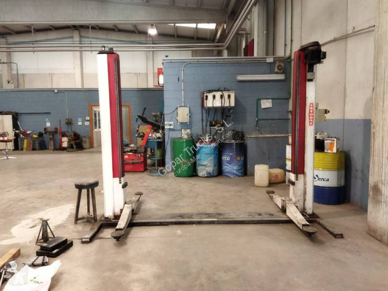 Equipamentos pesados  Elevadores para vehículos...
