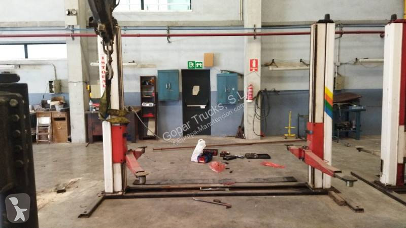 Equipamentos pesados  Elevadores para vehículos...