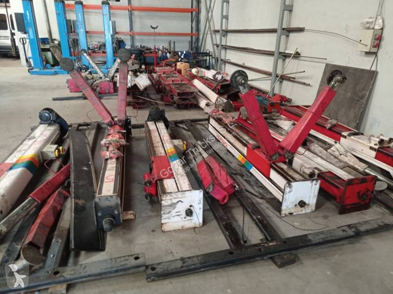 Equipamentos pesados  Elevadores para vehículos...