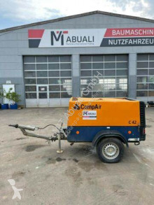 Material de obra Compair Kompressor DLT0406 ** 2006 * 715 H ** compresor usado