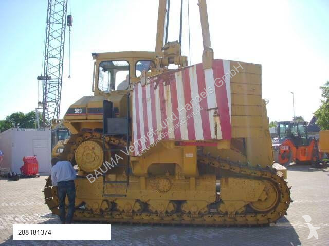 Material de obra Caterpillar 589 105 t Hubkraft...