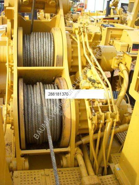 Material de obra Caterpillar 589 105 t Hubkraft...