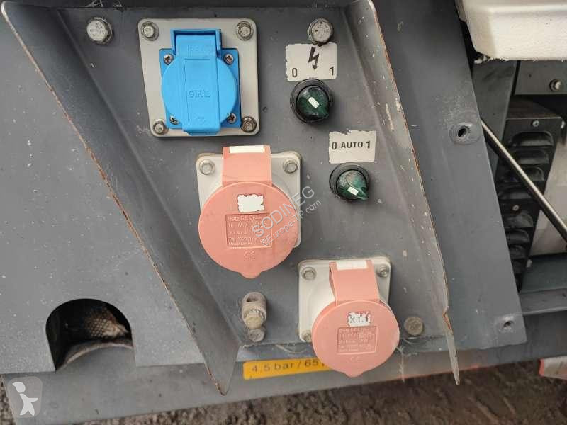Stavebný stroj Atlas Copco