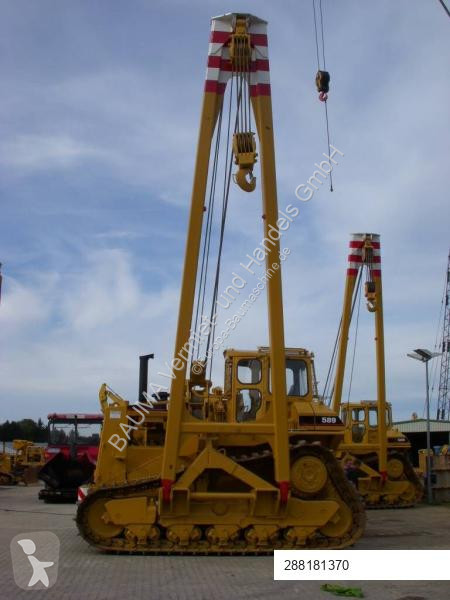 Material de obra Caterpillar 589 105 t Hubkraft...