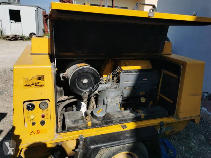 Stavebný stroj Atlas Copco XAS75