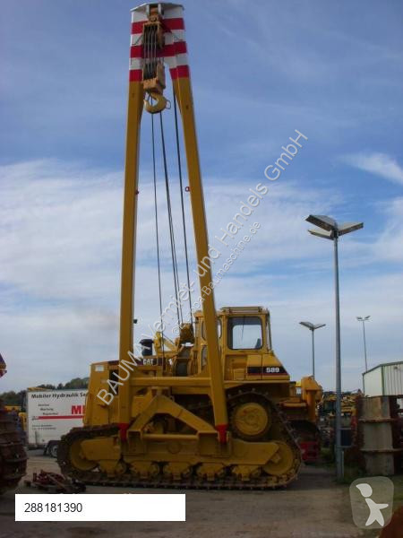 Material de obra Caterpillar 589 105 t Hubkraft...