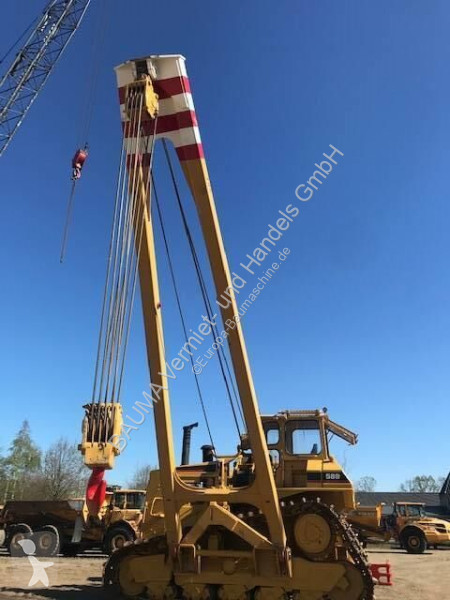 Material de obra Caterpillar 589 105 t Hubkraft...