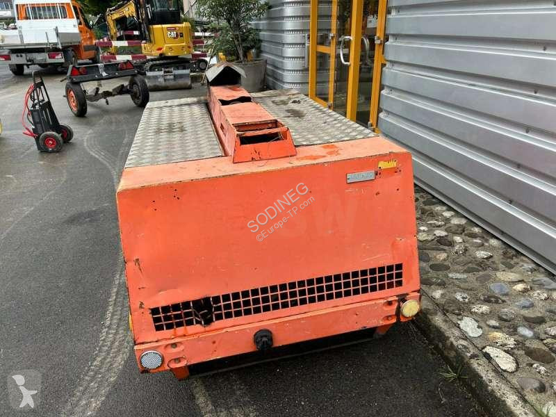 Stavebný stroj Atlas Copco