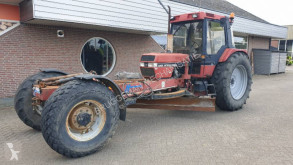 Tracteur agricole Case IH met hencon wegenschaaf 895XL occasion