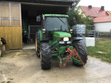 Lantbrukstraktor John Deere 6400 begagnad