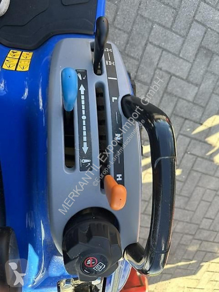 Ciągnik New Holland  Boomer 25 C + Sauerburger...