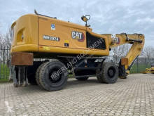Pelle sur pneus Caterpillar MH2024 with only 855 hours