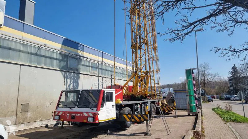 Kran Spierings Auto- Turmdrehkran Gittermast...