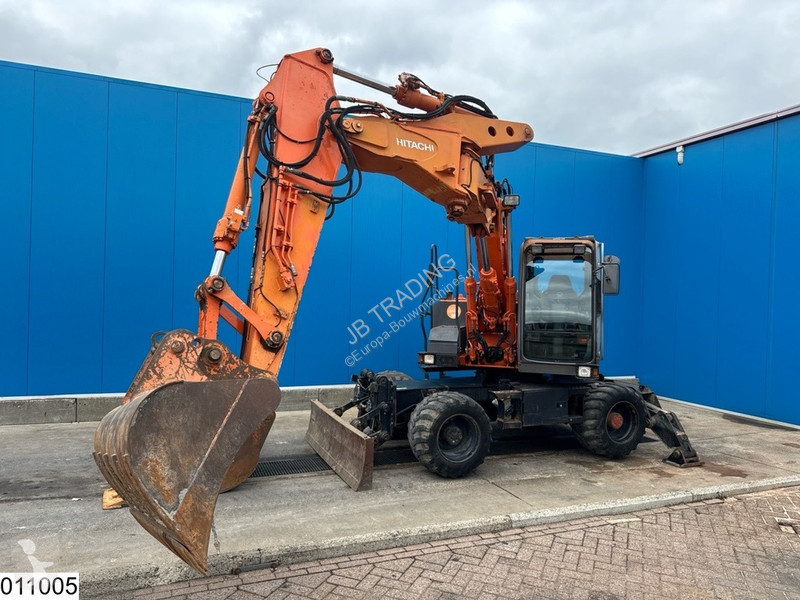 轮胎式挖掘机二手日立ZX 130 W 4x4, 87,5 kW, 13885 h, 2-piece boom
