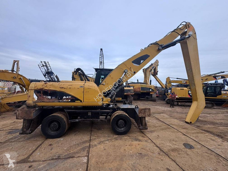 Kran Caterpillar M 322 D MH