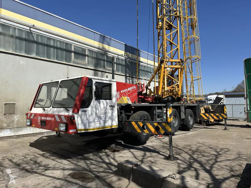 Kran Spierings Auto- Turmdrehkran Gittermast...