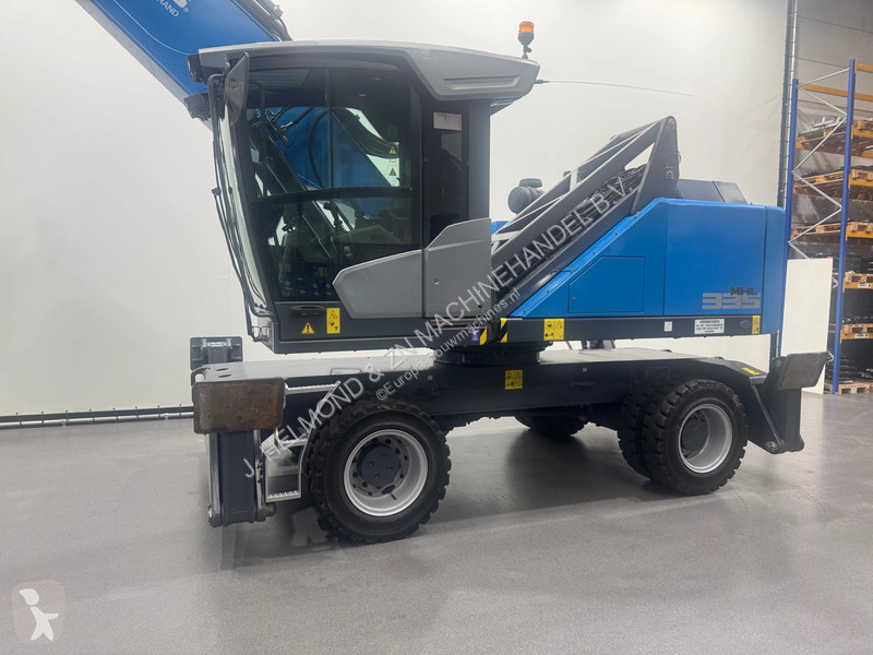 Excavator Fuchs Overslagkraan MHL 335 T4f