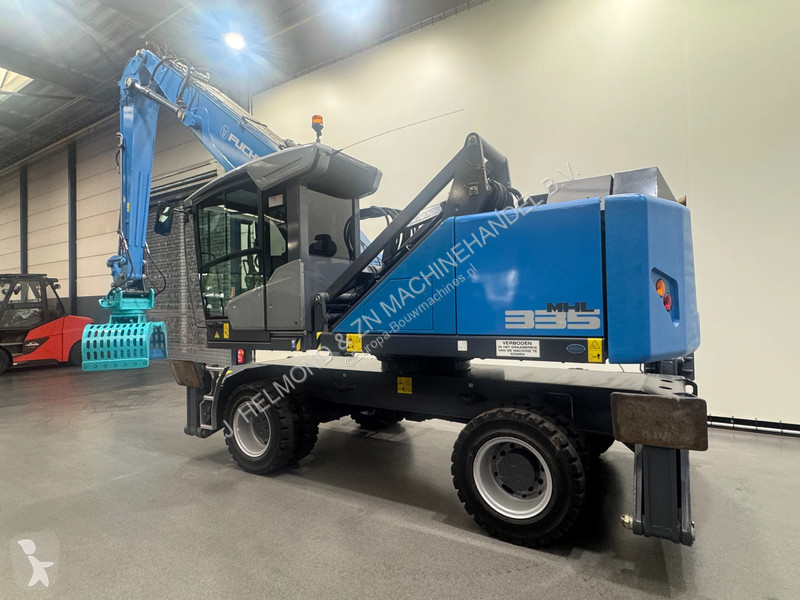 Excavator Fuchs Overslagkraan MHL 335 T4f