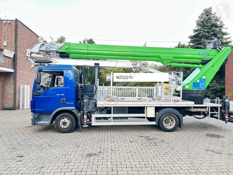 Grue MAN 7.180 mit Böcker Dachdeckerkran bis 37...
