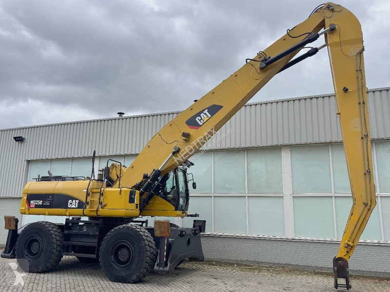Кран Caterpillar 325 D L MH