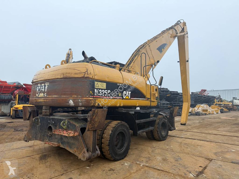 Кран Caterpillar M 325 C MH