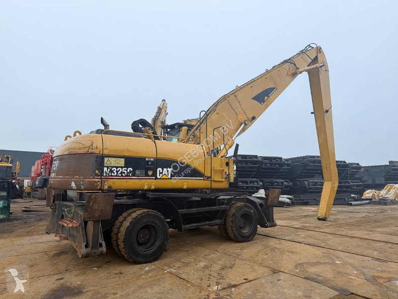 Кран Caterpillar M 325 C MH
