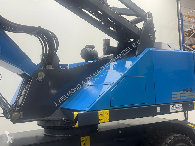 Excavator Fuchs Overslagkraan MHL 335 T4f