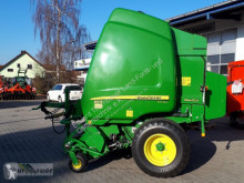 Henificación John Deere 864 Rotoempacadora usado