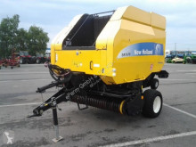 Press med runda balar New Holland