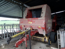 Press med runda balar New Holland