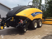 Press med runda balar New Holland