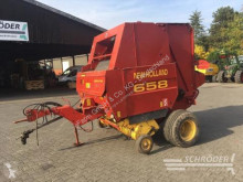 Presse à balles rondes New Holland