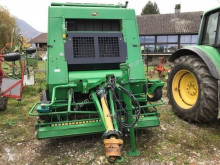 جمع الحشيش John Deere مكبس حزمات قشّ دائرية مستعمل