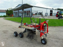 Fella haymaking used