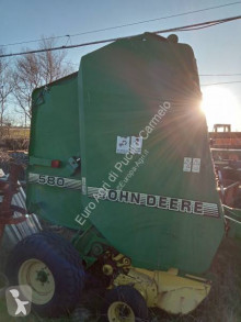John Deere 580 Pressa per balle tonde usato