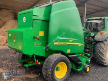 Henificación John Deere 864 Rotoempacadora usado