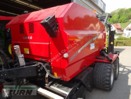 Kosenie lúk a sušenie sena Case IH Lis na okrúhle balíky ojazdený