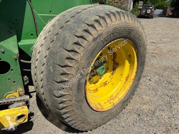 John Deere  580 haymaking
