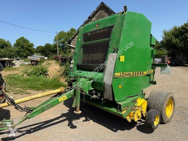 John Deere  580 haymaking