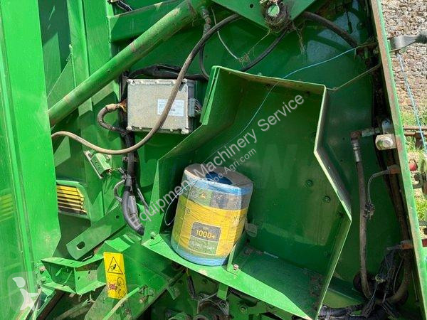 John Deere  580 haymaking