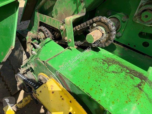 John Deere  580 haymaking