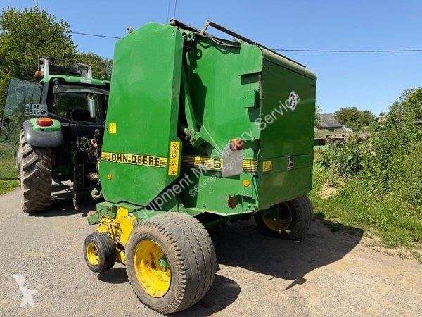 John Deere  580 haymaking