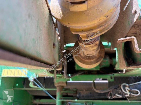 John Deere  580 haymaking