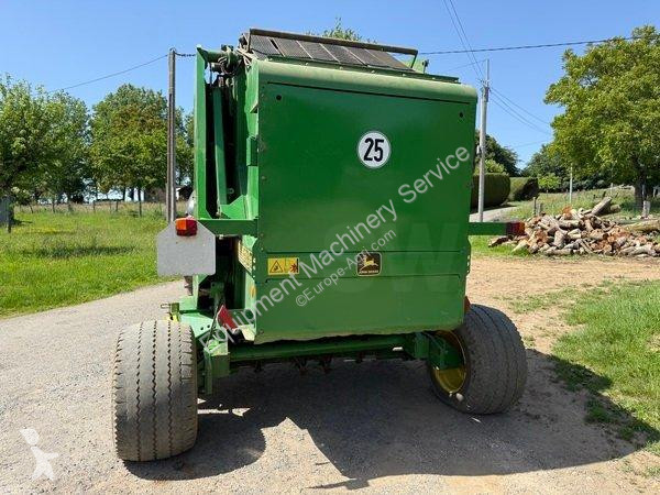 John Deere  580 haymaking