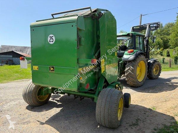 John Deere  580 haymaking