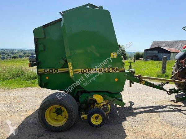 John Deere  580 haymaking