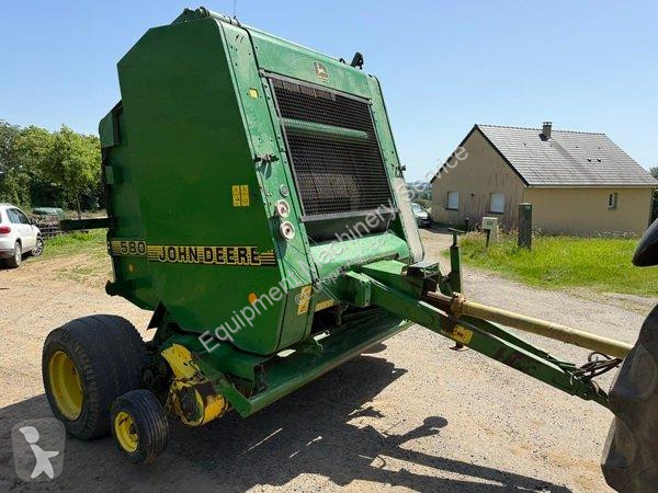 John Deere  580 haymaking