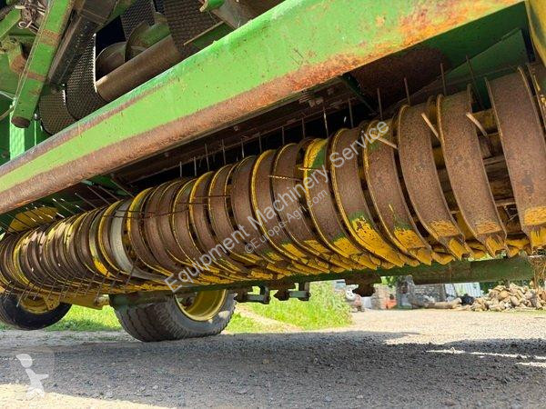 John Deere  580 haymaking